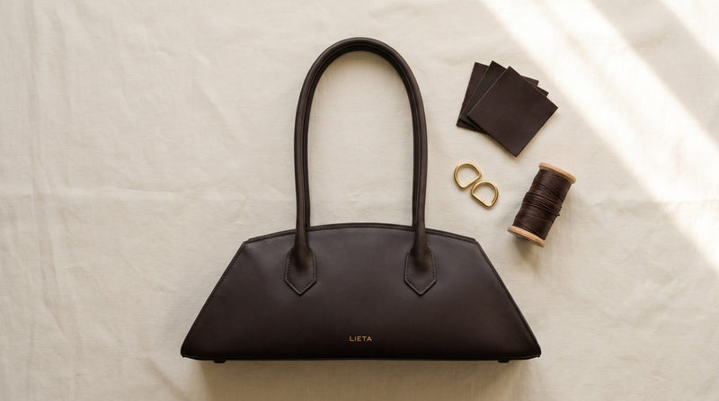 The Lungo in chocolate Italian calf leather on a near-white studio background.