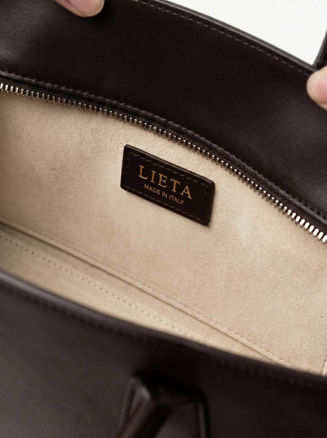 The Lungo in Chocolate — clean 07 interior LIETA tag cream Alcantara