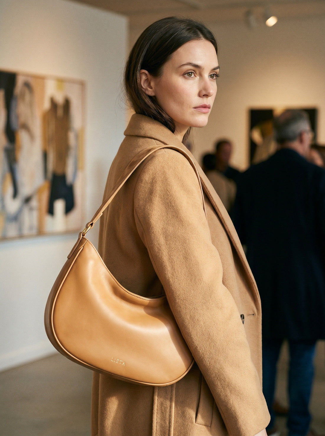 The Abbraccio in Camel — worn at a gallery